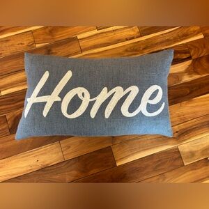 Blue Decorative Pillow with White 'Home' Text